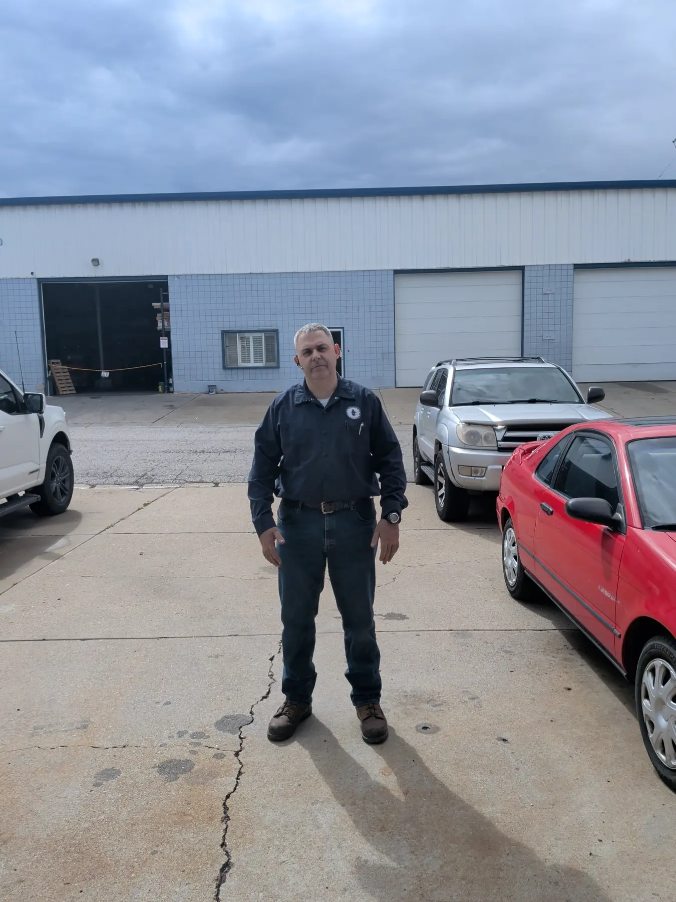 Doug, a WARV General Services Technician, standing outside the Bountiful shop