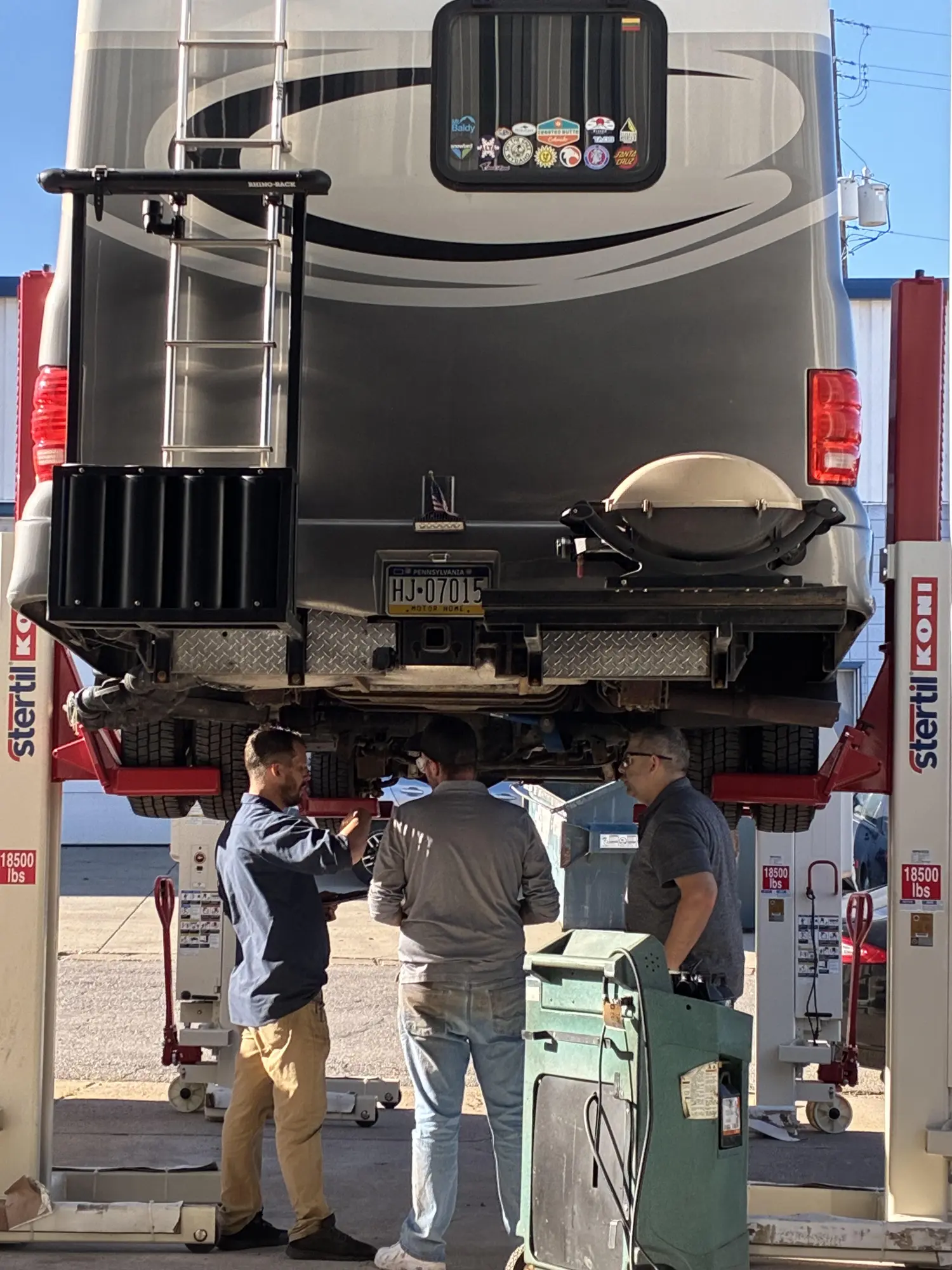 WARV team inspecting an RV undercarriage